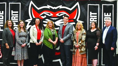 Enoch Autry/The Clayton Tribune. Pictured with their schools’ principals are this year’s four top teachers. From left are middle school principal Kechara Partin and RCMS teacher Emily Lovelady; primary principal Carla Truelove and teacher Sharon Lampros; high school principal Justin Spillers and teacher Hannah Miller; and elementary school teacher Natasha Mazarky and RCES principal Jonathan Welch. Mazarky also is this year’s system teacher of the year.