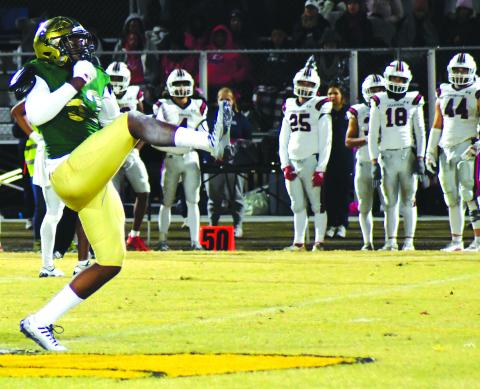 Enoch Autry/The Clayton Tribune. Eagle junior Gideon Herbert reacts to a sack in a prior game against Providence Day. The playoffs start Friday at home.