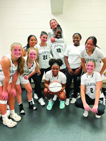 TFS Athletics. Senior Denika Lightbourne (center) poses with her TFS teammates after scoring 1,000 points in her career. She now holds three school records as well as being the fifth Lady Indian to score 1,000 points.