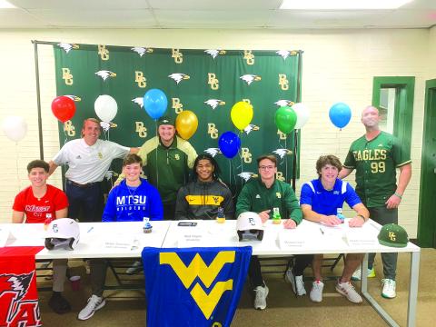 Submitted photo. On Nov. 9, five Rabun Gap-Nacoochee baseball seniors signed to play at a college level. From left, Lewis Rodriguez signed at Marist; Luke Earnhardt signed with Middle Tennessee State; Armani Foster signed at West Virginia; Brady Roulier signed with Missouri S&T, while Dylan Alonso joined Earnhardt signing at Middle Tennessee State. The five seniors are joined by from left, coaches Pearce Wright, Connor Cohea and Clark Wright. 