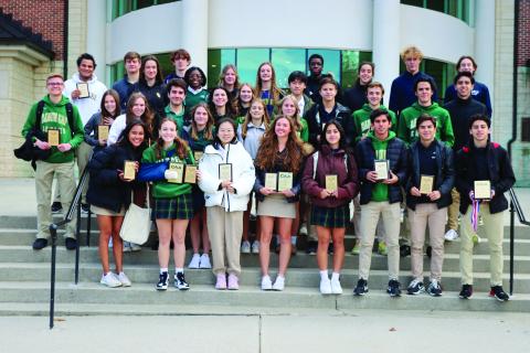 RGNS Athletics. The Rabun Gap-Nacoochee Upper School award winners pose with their plaques.