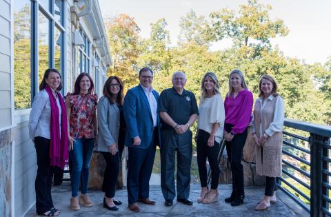 E. Lane Gresham/Tallulah Falls School. Shown in the photograph (from left) are Administrative Assistant to the President Melody Henderson, Joanna Radford, Maggie Rickman, Stacy Hall, Larry A. Peevy, Holly Borrow, Audrey Borchers and Heather NeSmith.