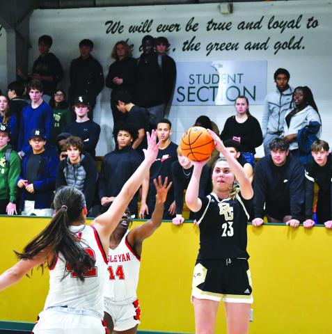 Luke Morey/The Clayton Tribune. Senior Tuana Coskun hits a jumper in the home opener against Wesleyan Christian Academy on Friday night. Coskun ended with 18 points and seven rebounds as she’s been leading the team with 15 points per game. On Saturday against Asheville, Coskun scored 13 in only the Lady Eagles’ second loss of the season.
