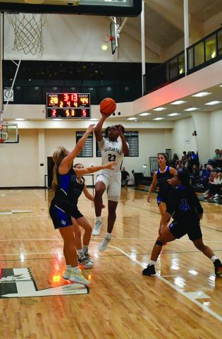 Luke Morey/The Clayton Tribune. Denika Lightbourne goes up for a shot against Lake Oconee Academy on Wednesday night. The Lady Indians are now on a four game losing streak.