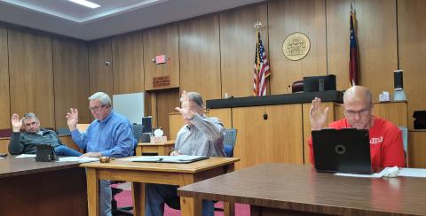 Megan Broome/The Clayton Tribune. Rabun County commissioners vote Tuesday to approve the first reading of an ordinance to allow campers and motorhomes on a property during construction. 
