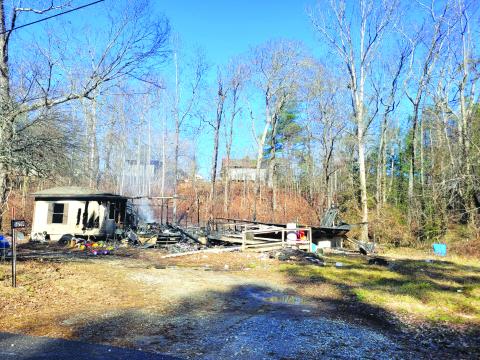 Megan Broome/The Clayton Tribune. The cause of the fire at 579 Connector Road off Camp Creek Road in Wiley remains under investigation by the State Fire Marshal’s Office. 