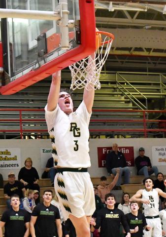 Luke Morey/The Clayton Tribune. Rabun Gap senior Theo Antinori goes up for a dunk late in the fourth quarter against The Skill Factory on Saturday, Jan. 21. Antinori finished with 27 points as he helped the Eagles defeat the third-ranked team in Georgia. 