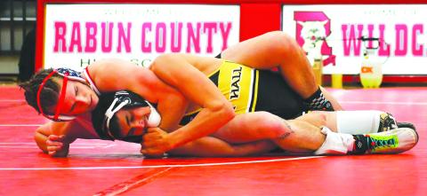 Luke Morey/The Clayton Tribune. Rabun County senior Miles Watts grapples with an East Hall opponent on Tuesday, Jan. 24. Watts looks to compete again in the GHSA state championship after taking state runner-up last year. 