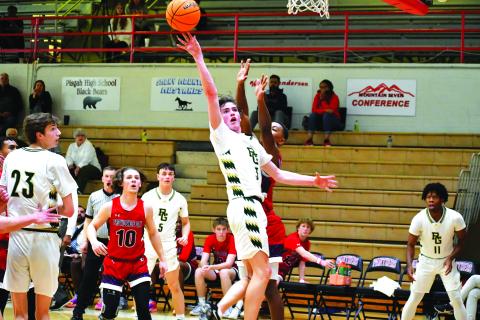 Luke Morey/The Clayton Tribune. RGNS senior Theo Antinori puts up two of his 13 points he scored in the first uarter. Antinori and the Eagles fell 49-45 to Providence Day in the state quarterfinals.
