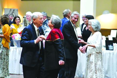 Enoch Autry/The Clayton Tribune. Couples Tom and Becky Callahan (foreground) and Greg and Willa Presmanes, all of Tiger, dance at the F.A.I.T.H. benefit Sweetheart Ball on Feb. 11 in the Rabun County Civic Center as the band “Party at the Limit” from Atlanta plays music.  The event that was catered by The Shed raises funds for F.A.I.T.H. programs that “fight abuse in the home.”