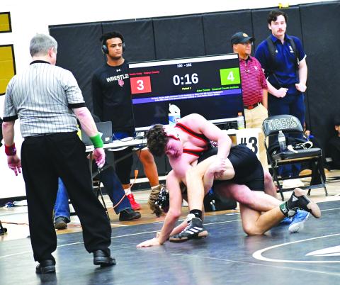 Luke Morey/The Clayton Tribune. Rabun County’s Justin Cody gets control of John Conner from Emanual County Institute during the sectionals tournament on Saturday, Feb. 11. Cody is one of four RCHS wrestlers heading to the State tournament that begins on Thursday, Feb. 16.