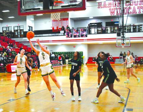 Luke Morey/The Clayton Tribune. RGNS junior Kornelia Ignerska hits a layup in the second half against Legion Collegiate Academy on Saturday, Feb. 11. Ignerska ended with eight points as the Lady Eagles won 61-47 in the final game of the season. 