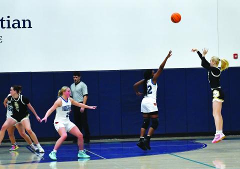 Luke Morey/The Clayton Tribune. RGNS junior Monna Julkunen puts up a shot against Asheville Christian Academy on Thursday, Feb. 2. Julkunen ended with 12 points as the Lady Eagles won 55-33. 