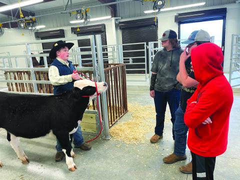 Submitted photo. FFA members give a tour of the Agricenter facilities to all interested guests after the Rabun County FFA officers hosted The Rising Sun Community Breakfast on Tuesday.