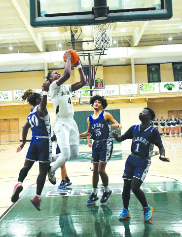 Luke Morey/The Clayton Tribune. TFS senior Anfernee Hanna finished off his TFS career third in school history in points with 1,204. 
