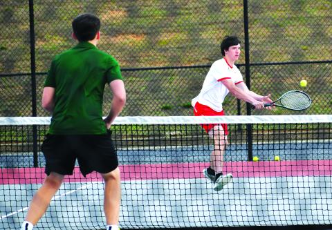 Luke Morey/The Clayton Tribune. RCHS senior Jayton Henry returns a shot against Tallulah Falls. Henry and Om Patel competed at No. 1 doubles against Zachary Carringer and Jake Owensby of Tallulah Falls. Henry and Patel fell 4-6, 2-6. 