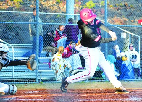 Luke Morey/The Clayton Tribune. Rabun County’s Parker Smith gets a hit against Elbert County on Tuesday, March 14 in the seventh inning. Smith later scored as a part of a late rally from the Wildcats that ultimately fell short with Elbert County winning 9-5. The Wildcats next travel to Elberton for a double header on Friday, March 17. 