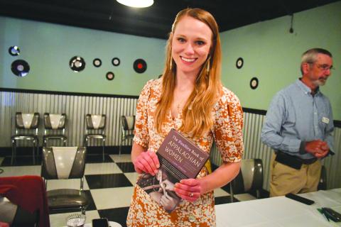 Megan Broome/The Clayton Tribune. Kami Ahrens, curator and director of education for Foxfire, is excited to hold a book launch event for the book she wrote and edited titled “The Foxfire Book of Appalachian Women: Stories of Landscape and Community in the Mountain South.” Crowds of people attended the event held at the Rabun County Civic Center Diner. 