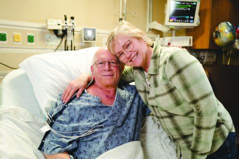Submitted photo. Bill and Karen Mayfield, who traveled from Minnesota to Gainesville for Bill’s robotic heart surgery, wait to be discharged from Northeast Georgia Medical Center (NGMC) on Feb. 9, 2023 – just two days after Bill’s procedure. Bill was the first patient to ever receive robotic heart surgery at NGMC. 