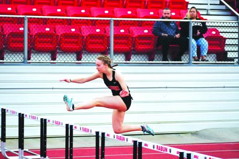 Luke Morey/The Clayton Tribune. Kiley Turner won both the 100 and 300 meter hurdles in the first track meet of the season. Turner helped the Lady Cats to a one point victory.