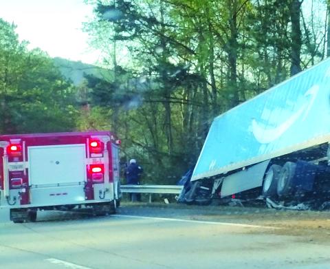 Photo courtesy of Conner Horn. Emergency personnel work the scene of a single vehicle crash involving a semi-truck with an Amazon Prime logo on Ga. 15 just south of McKay Road in Lakemont Monday, April 10. The southbound lane was shut down for a short time as personnel worked the scene. 