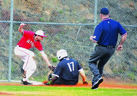 Luke Morey/The Clayton Tribune. Rabun County sophomore Parker Smith tags Zaiden Cox during a home game on Tuesday, April 4. 