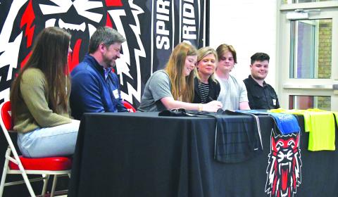 Luke Morey/The Clayton Tribune. Rabun County senior Hannah Thompson (center) signed her letter of intent to play soccer at Truett McConnell University on Wednesday, March 29. Joining Hannah are (from left), sister Grace, parents Joey and Marla, and brothers Luke and Aaron Thompson. 