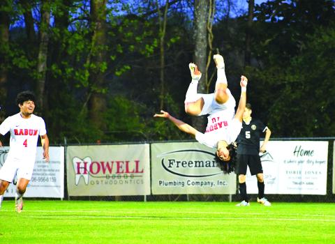 Luke Morey/The Clayton Tribune. Rabun County Wildcat junior Luis Lopez flips in celebration of his third goal against Commerce on Thursday, March 30. The No. 4 seed Wildcats will travel to take on Dalton Academy on Wednesday, April 12.  