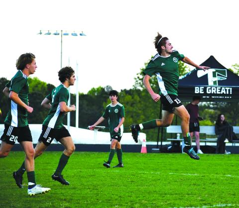Luke Morey/The Clayton Tribune. TFS sophomore Landon Hall celebrates his goal against Darlington on Wednesday, April 12.