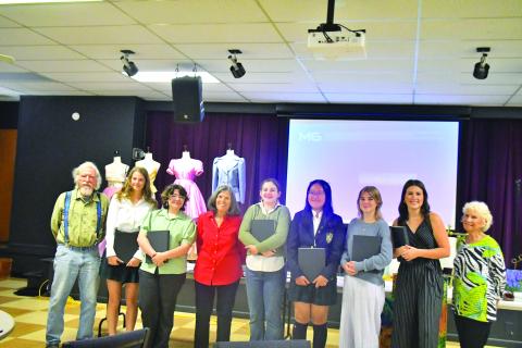 At the scholarship celebration are Dietrich Hoecht, committee member (left); Kailyn Neal; Rebekah Ramey; Penny Bradley, North Georgia Arts Guild Scholarship Program committee chair; Autumn Smith; Ruichen (Sarah) Zhang; Zoey Townsend; Abigail Carver; and Kathy Beehler, committee member.