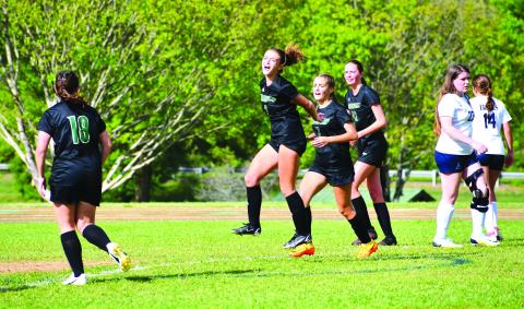 Luke Morey/The Clayton Tribune. Lady Eagle junior Georgia Mattis celebrates her goal against Asheville School on Friday, April 28. 
