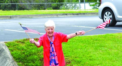 Enoch Autry/The Clayton Tribune. Residents in Tiger and throughout the county waved American flags and said “thanks for serving” to those who drove in the Armed Forces Day Convoy on May 20.