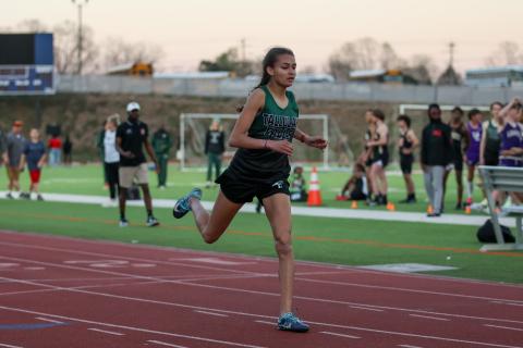 Courtesy of Austin Poffenberger. Julianne Shirley won a region title as she finished first in the 400-meter dash.