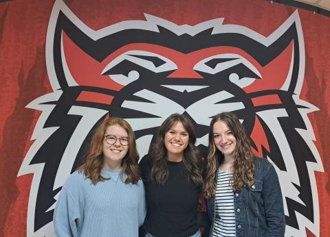 Megan Broome/The Clayton Tribune. Valedictorian Skylar Krockum, Salutatorian Bailey Maloney and Historian Hailey Hutcheson lead Rabun County’s graduating class.