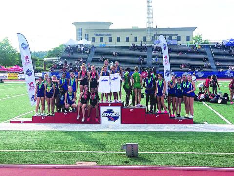 TFS photo. The Tallulah Falls School girls 4X400 relay team (center) -- composed of Dani Prince, Sofia Rueda, Molly Mitchell and Julianne Shirley -- won the state championship in Rome on May 13 with a time of 4:07.70. The Lady Indians took 10th place overall, while the Indians took 25th. 