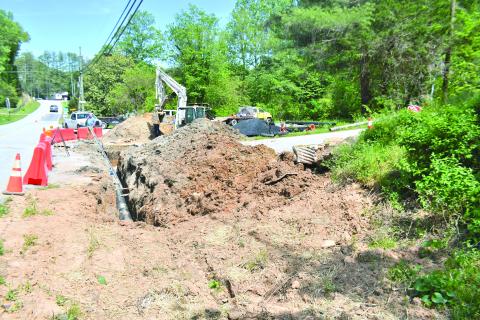 Megan Broome/The Clayton Tribune. Mack Jones Enterprises, out of Flowery Branch, Ga., works with City of Clayton Public Works on Old Highway 441 in the area of Hillside Drive and Summit Drive in Clayton on infrastructure repairs for better water quality and fire protection. Motorists are asked to use caution and slow down while workers are in the area. 