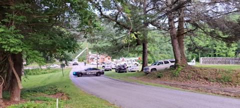 Megan Broome/The Clayton Tribune. Georgia Power crews work to restore power to area neighbors after a Mack truck crash at the intersection of Warwoman Road and Poly Gap Road June 1. Left: Photo courtesy of Clayton Police Department. A Mack truck crashed into a Georgia Power utility pole at the intersection of Warwoman Road and Poly Gap Road in Clayton June 1 around 3:21 p.m. Power was out to area residents for several hours and the section of the road was closed. 