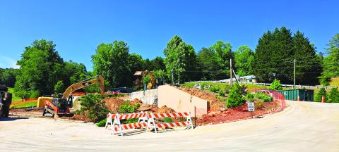 Tom Adams Construction, of Rabun Gap, works to demolish the Rabun County Golf Club building. Demolition is underway after the strength of the building was compromised following a Dec. 23, 2021, structure fire. The building will be built back similarly with the golf carts relocated to the maintenance shed. 