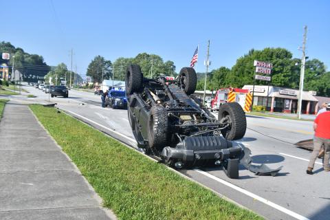 Megan Broome/The Clayton Tribune. First responders work the scene of a two-vehicle crash at Ingles Wednesday morning. Minor injuries were reported and a Sylva, N.C., man faces traffic charges.
