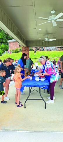 Megan Broome/The Clayton Tribune. Children enjoy an Ice Cream Sundae party at the Rabun County Public Library May 31 to kick off this year’s Summer Reading Program theme “All Together Now.” 