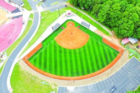 Photo courtesy Jason Hogan. An aerial photo of the newly finished Rabun County softball field shows the new features of the field. Bullpens were added to both sides of the field, as well as new dugouts to go along with the turf field. Two Wildcat logos flank home plate to complete the design.