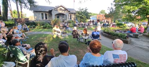 Megan Broome/The Clayton Tribune. A fundraiser for Boy Scouts of America Troop 6 brought community support to The Rock House in Clayton July 7 for the First Friday Fest sponsored by the Clayton Merchants and Business Association (CMBA). 