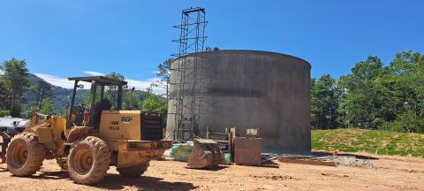 Megan Broome/The Clayton Tribune. Crews continue work on construction of the 750,000 gallon ground-level water storage tank located on Yorkhouse Road in Rabun Gap. It is scheduled to be completed and on line in late September-early October 2023, with a 90-day function testing period to follow. 