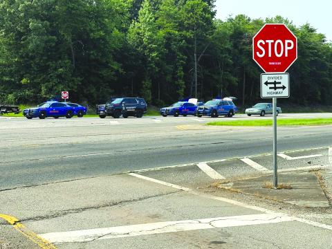 Photo courtesy Habersham County Public Information. Law enforcement vehicles are parked in a line on Sunday, July 16, at the crash scene in Habersham County as five people died.