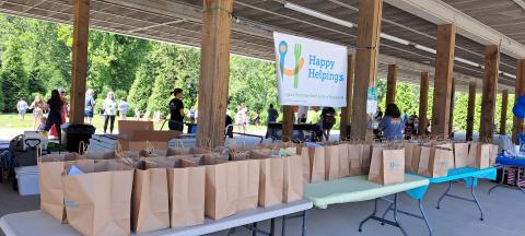 Megan Broome/The Clayton Tribune. Healthy lunches were served during the Happy Helpings, Georgia’s Food Service Program for Kids, kickoff at the pavilions behind the Rabun County Public Library June 13. 