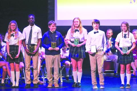 Submitted photo. Students pose with their Spirit of Rabun Gap Award. From left to right: Callie Parker of Franklin, N.C.; Ayo Iyanda of Atlanta; Camden Sherwood of Franklin, Ga.; Harper Phillips of Rabun Gap; Asa White of Rabun Gap; and Hattie Williams of Demorest, Ga.