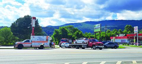 Megan Broome/The Clayton Tribune. Both vehicles were towed away following a two-vehicle crash at Ramey Boulevard June 5 that resulted in minor injuries. 