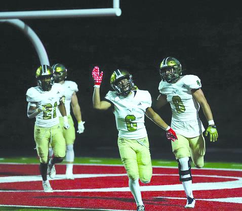 Photo courtesy Christy Kirkpatrick. Rabun Gap-Nacoochee’s Patrick Williams (6) celebrates the Eagles’ scoop-and-score that led to the RGNS 35-24 over nationally ranked Baylor in Chattanooga on Aug. 18. The Eagles are at home on Aug. 25. 