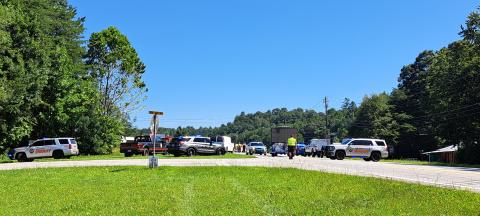 Megan Broome/The Clayton Tribune. Megan Broome/The Clayton Tribune. Rabun County agencies including Fire Services, EMS, Sheriff’s Office, Clayton Police Department, Search and Rescue (SAR) and the Coroner’s Office work the scene of a two-vehicle fatal crash involving a tractor trailer July 31. The area was taped off and surrounded by emergency vehicles. Northbound and southbound lanes were completely shut down for hours.Left: A memorial with flowers is displayed near the center aisles at the Clayton Ingles 