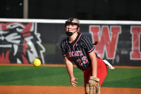 Wade Cheek/The Clayton Tribune. Pitcher Presley Burrell pitches a one-run complete game against Gainesville High School Tuesday evening as she struck out four Red Elephants. 